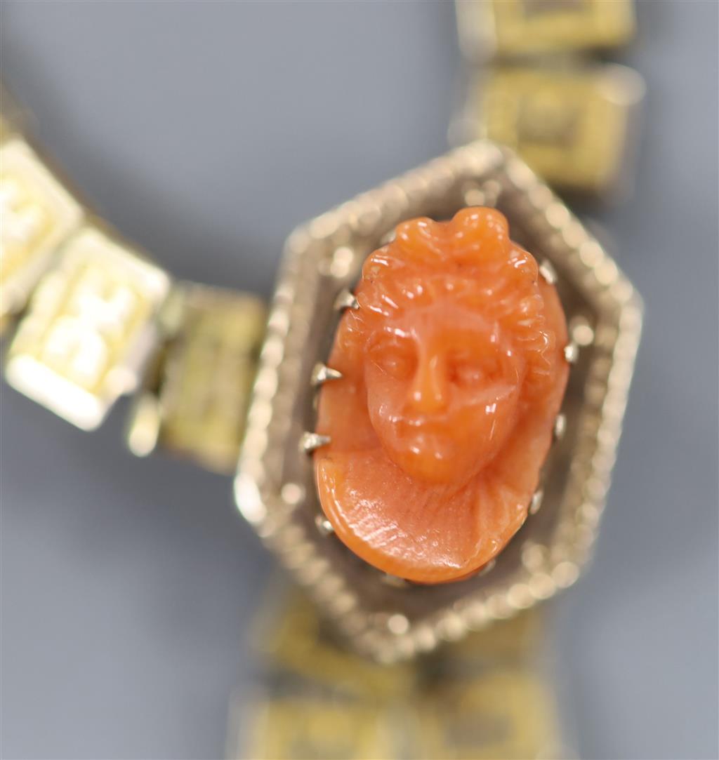 A yellow metal square link and carved coral mounted tassel necklace, 50cm, gross 18.4 grams & a paste ring.